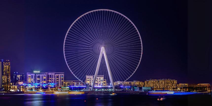 A dazzling night view of Ain Dubai, the world’s largest observation wheel, glowing with lights on Bluewaters Island — one of the top must-see things in Dubai, offering breathtaking skyline views, thrilling rides, and unforgettable nighttime experiences.